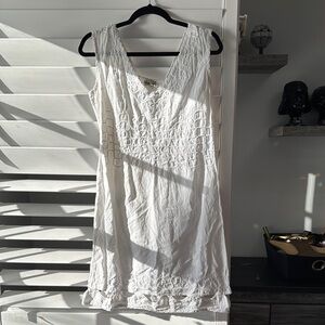 White Sleeveless Dress with Embroidered Details